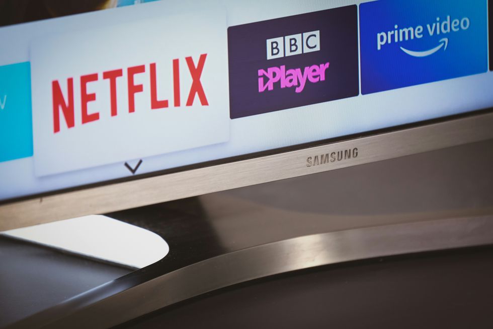 netflix logo pictured next to bbc iplayer on a samsung smart tv