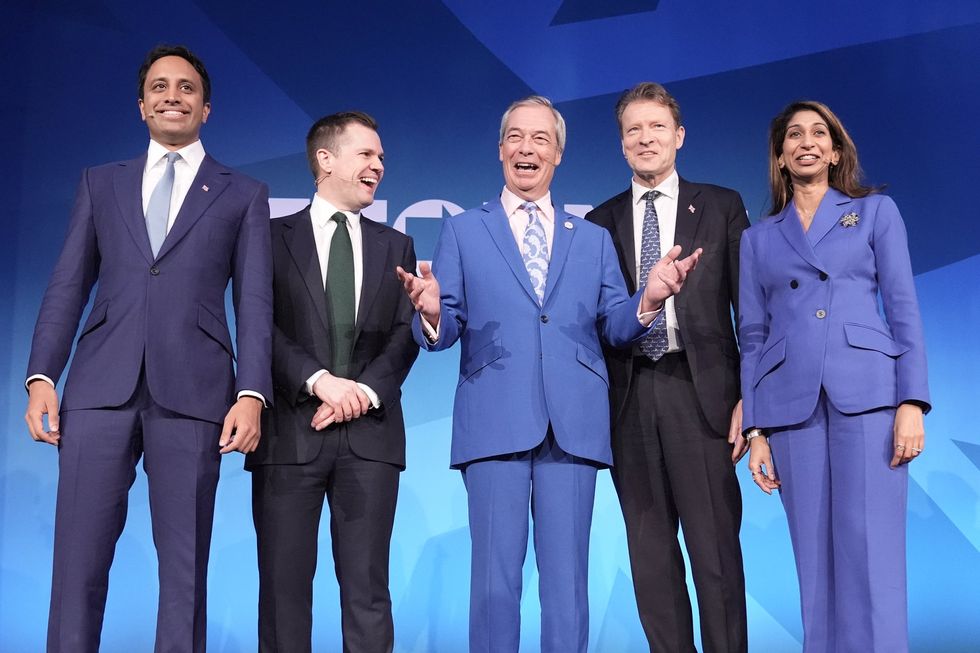 Nigel Farage accompanied by the key members of his Shadow Cabinet