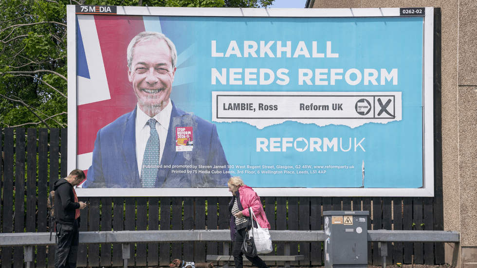 Nigel Farage on a Reform UK campaign poster