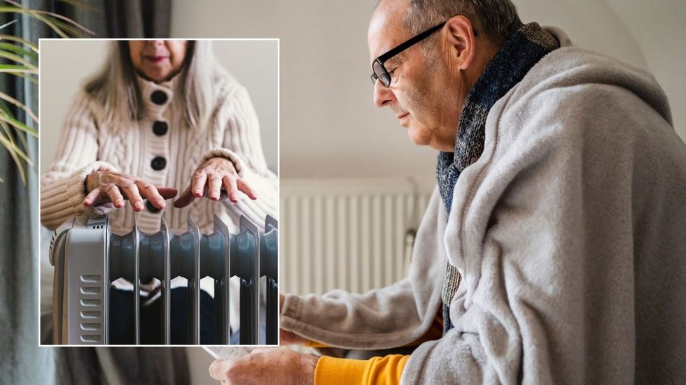 Older man looking at energy bill and radiator