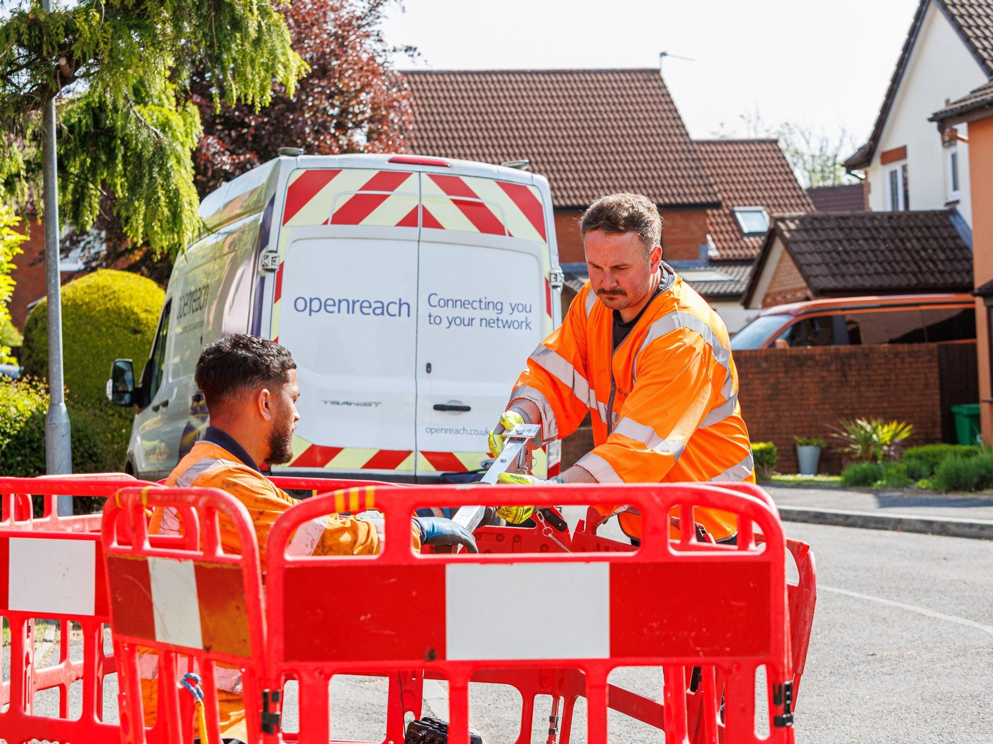 Openreach engineers pictured in the street working