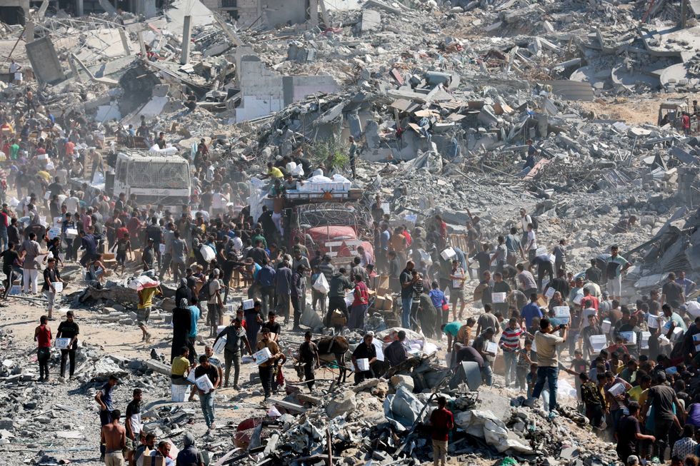 Palestinians receiving aid in the Gaza Strip