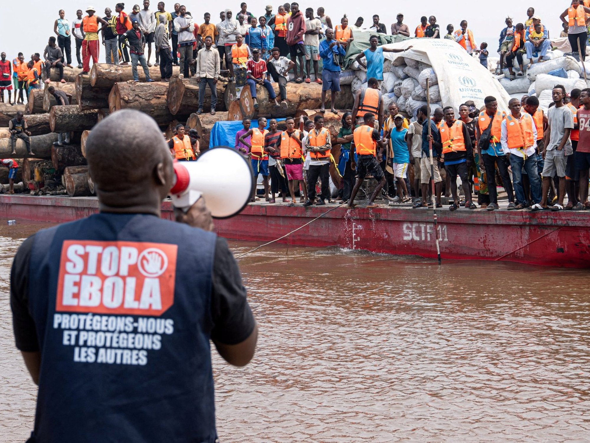 passenger boat, after, according to officials, a passenger who had disembarked earlier died after developing symptoms consistent with Ebola, in a place given as Kinshasa,