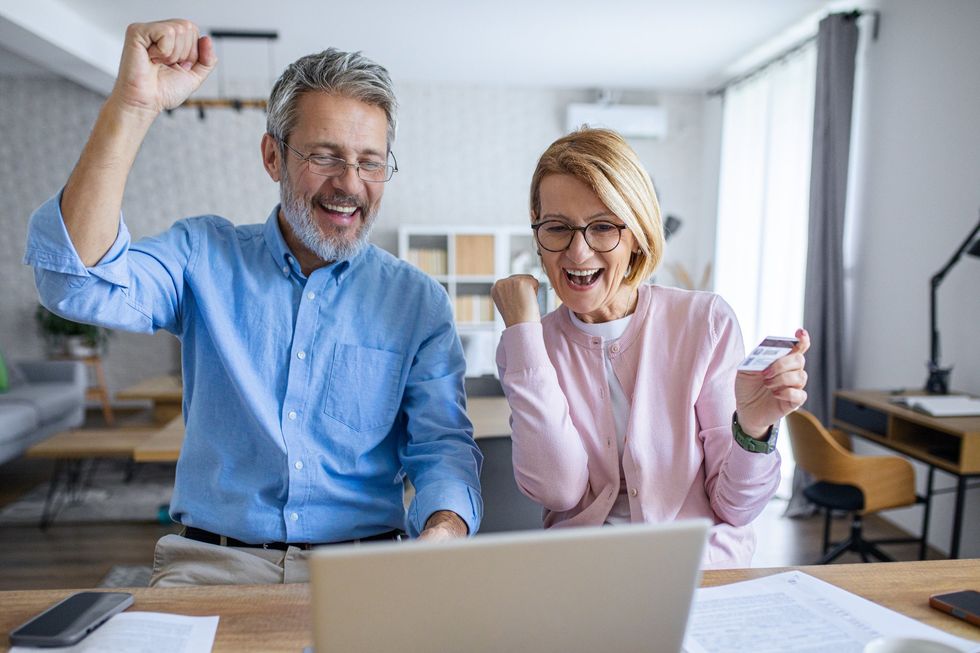 Pensioner couple at laptop