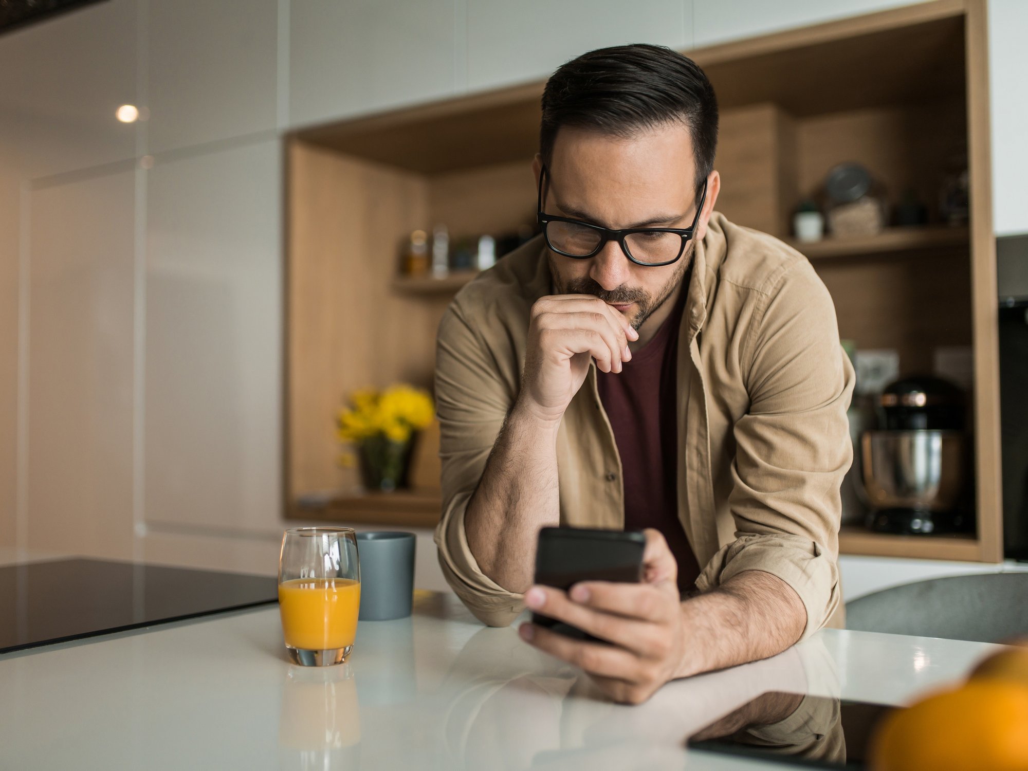 Person looks at phone