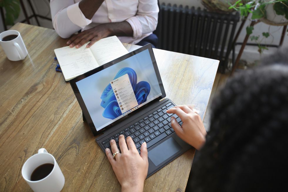 Person typing on Windows desktop