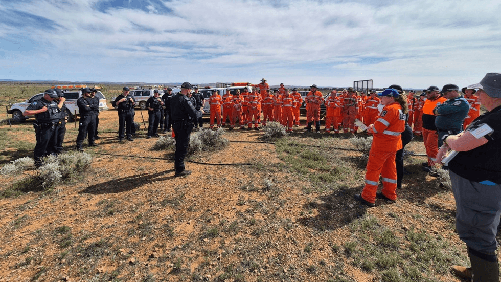 Police and volunteers looking for Gus Lamont