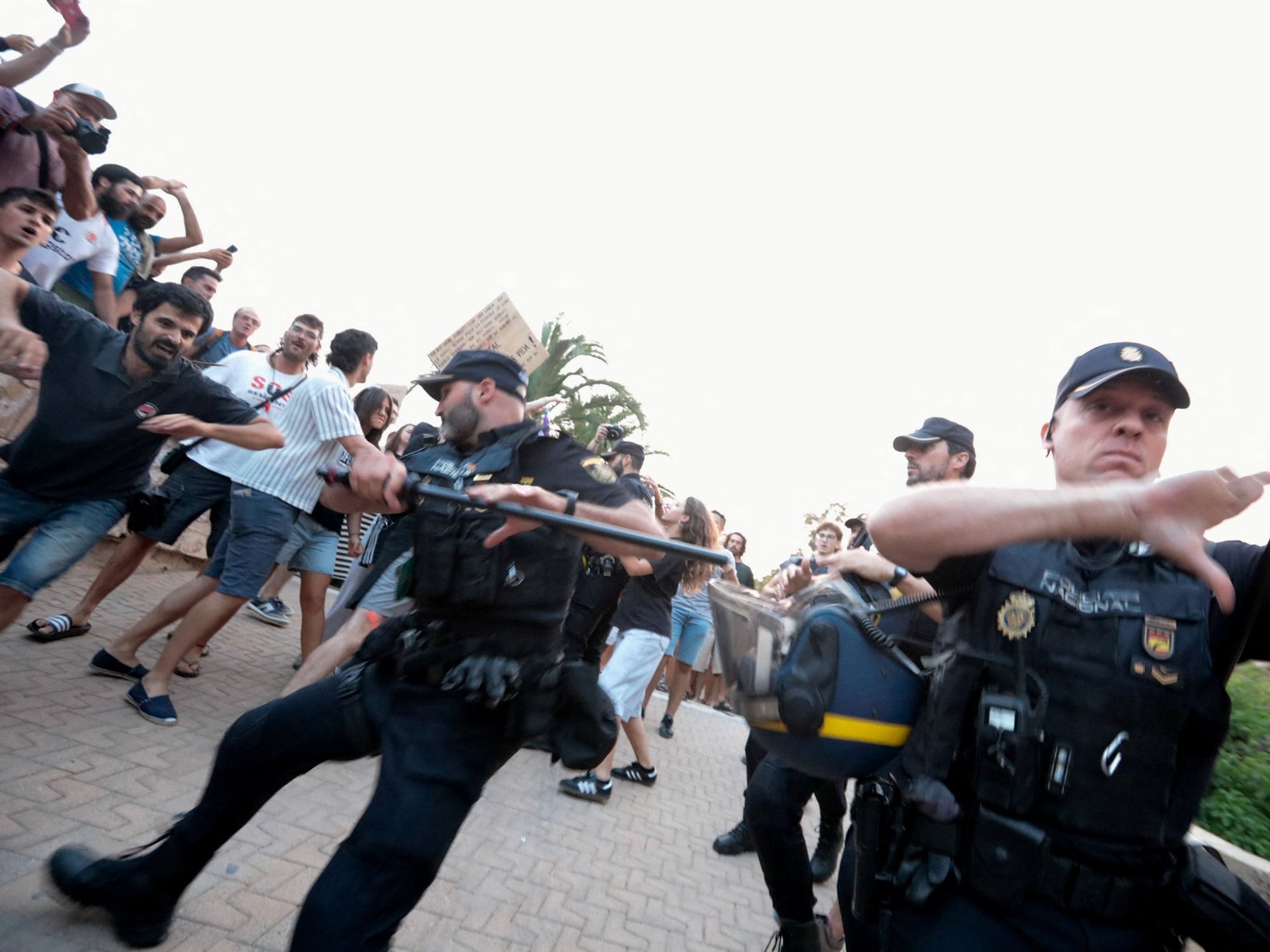 Police in Majorca swinging batons