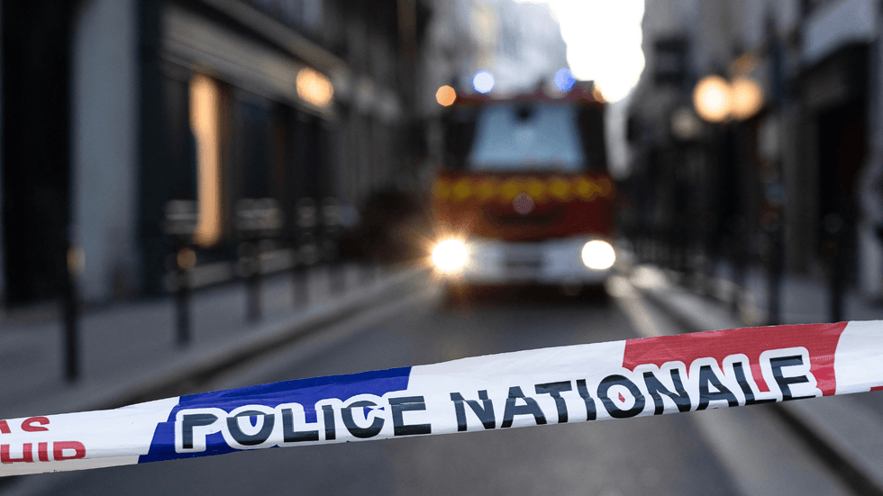 Police Nationale cordon on Parisian street