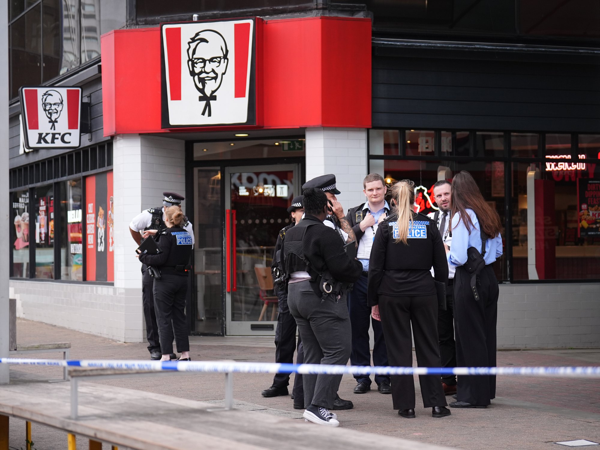 Police officers outside KFC