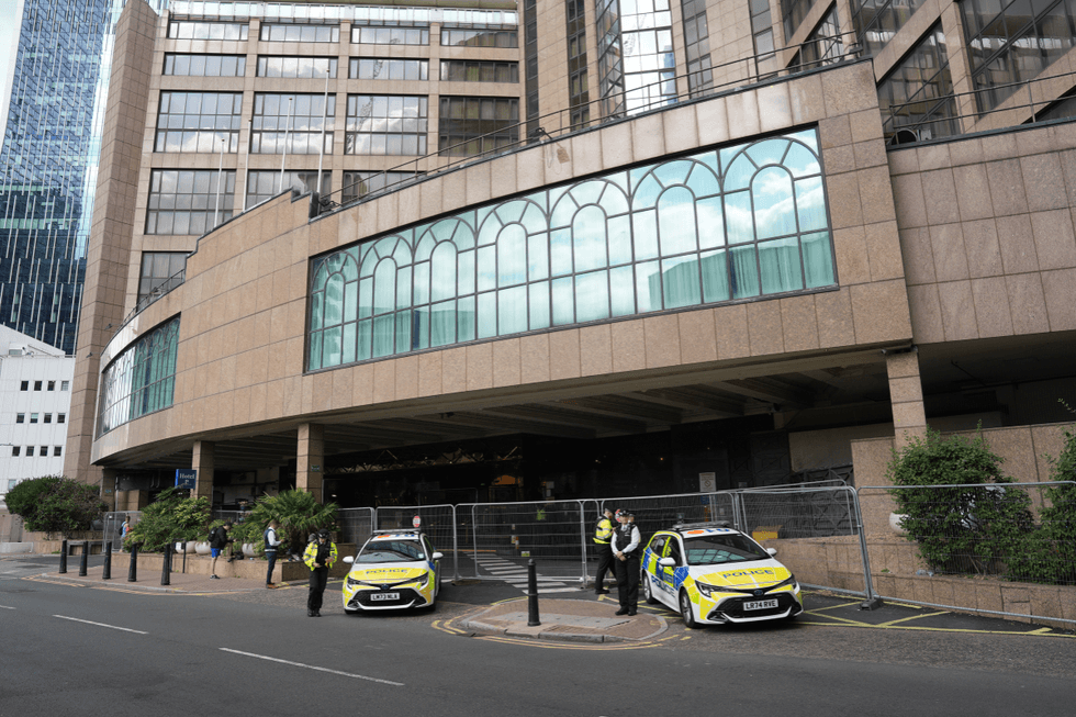 Police officers outside the Canary Wharf hotel (file pic)