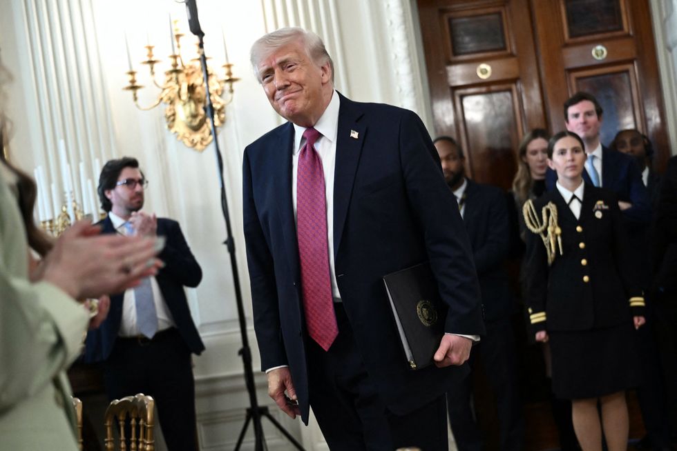 President Donald Trump was met with awkward silence during a White House gathering on Tuesday when he sought validation for his ban on transgender athletes in women's sports