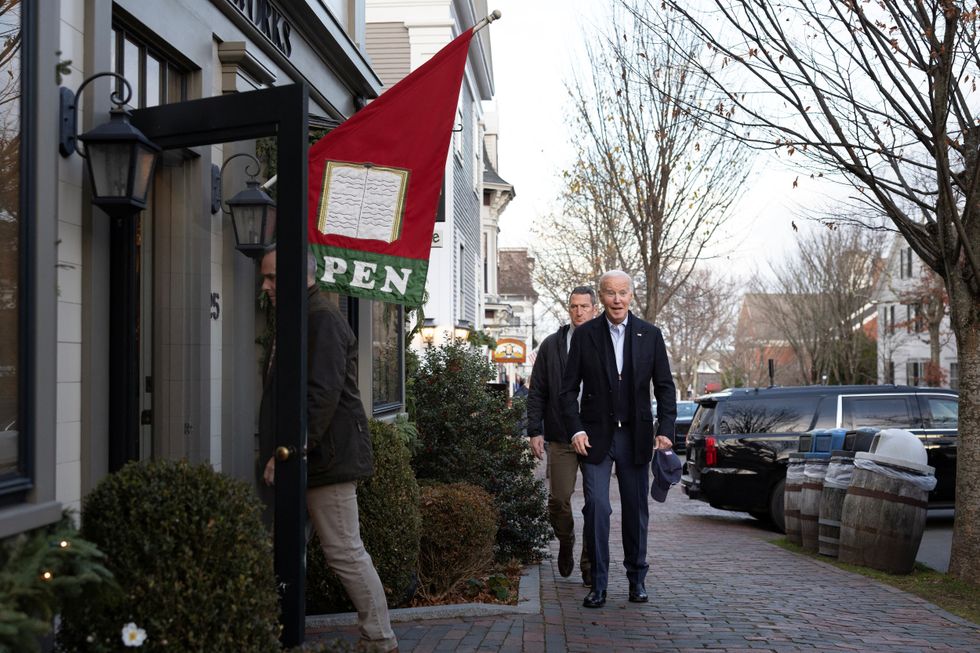President Joe Biden walks next to Nantucket Bookworks in Nantucket
