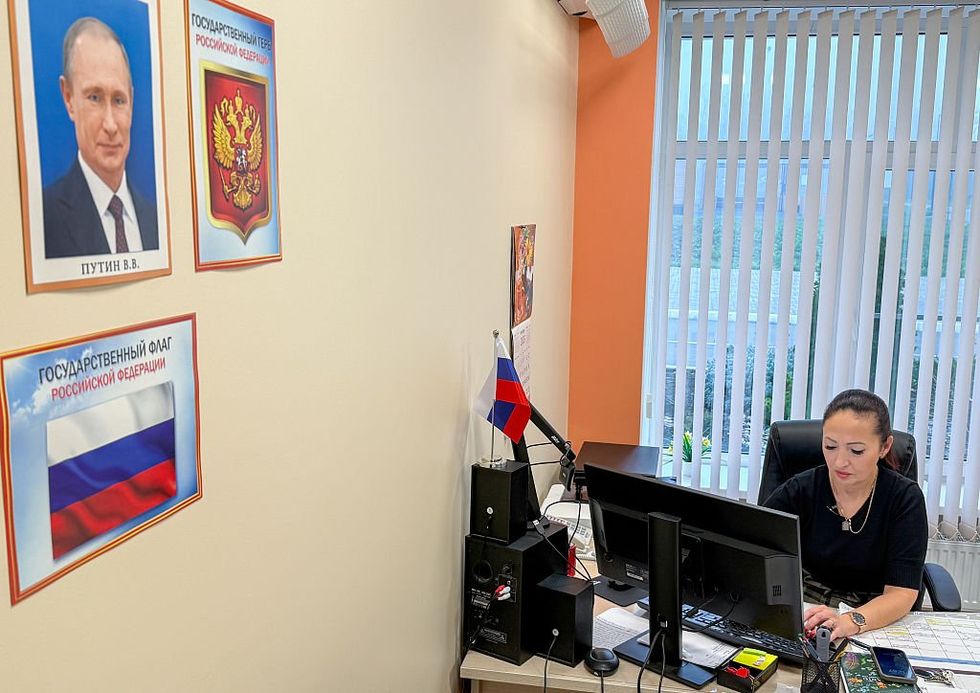 President Putin's official portrait in an office,