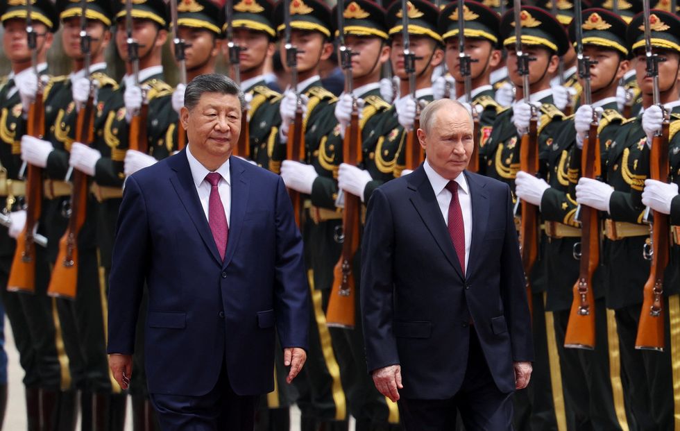 President Xi (left) Vladimir Putin (right)