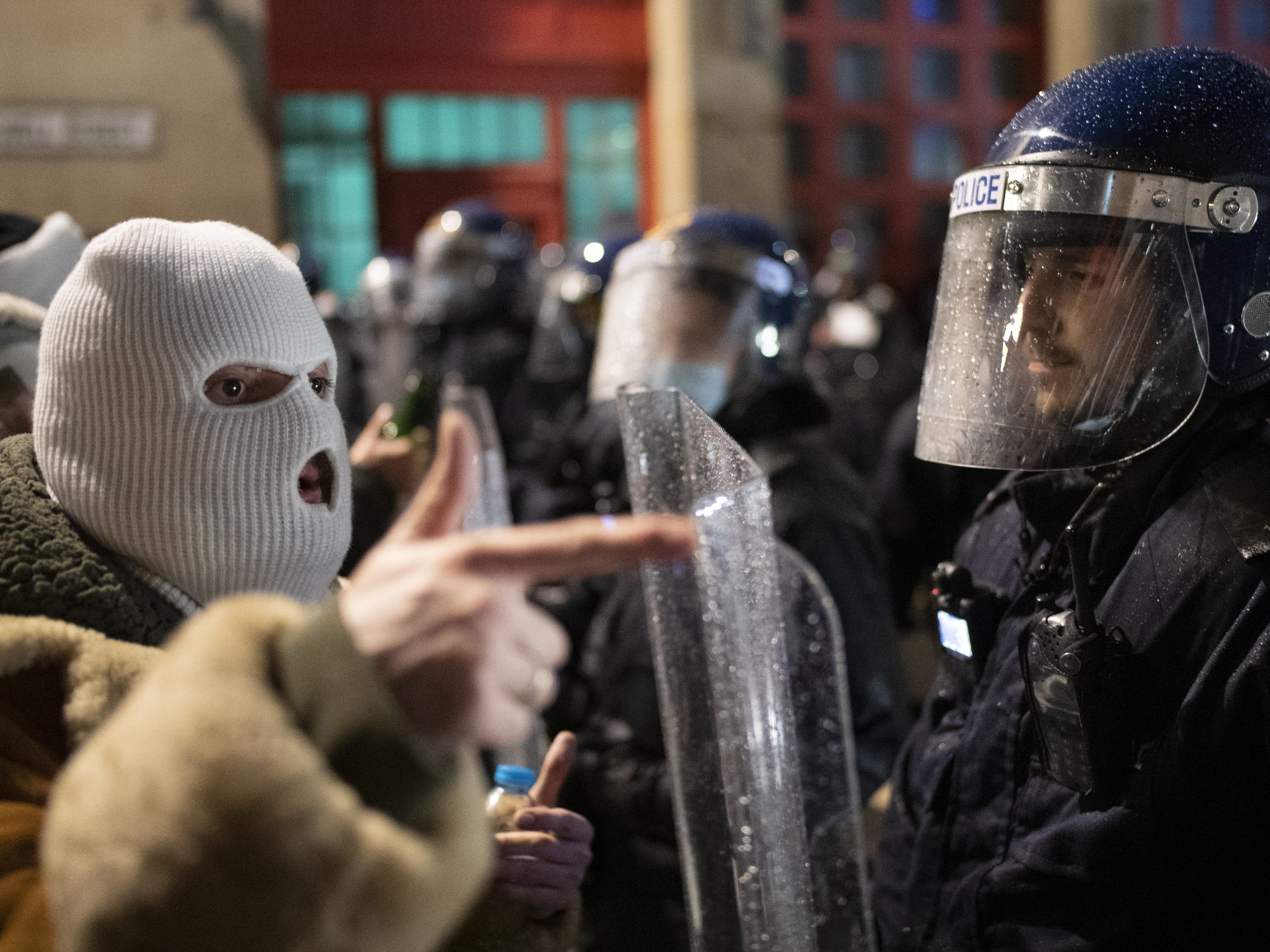 Protesters wearing face coverings