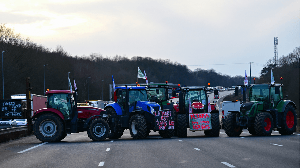 Protesting farmers blockade the A10 highway with tractors