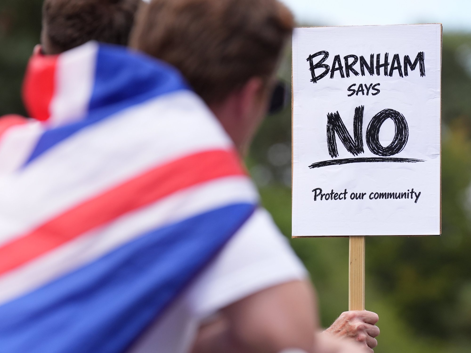Protests against RAF Barnham, sign reading 'Barnham says no. Protect our community'