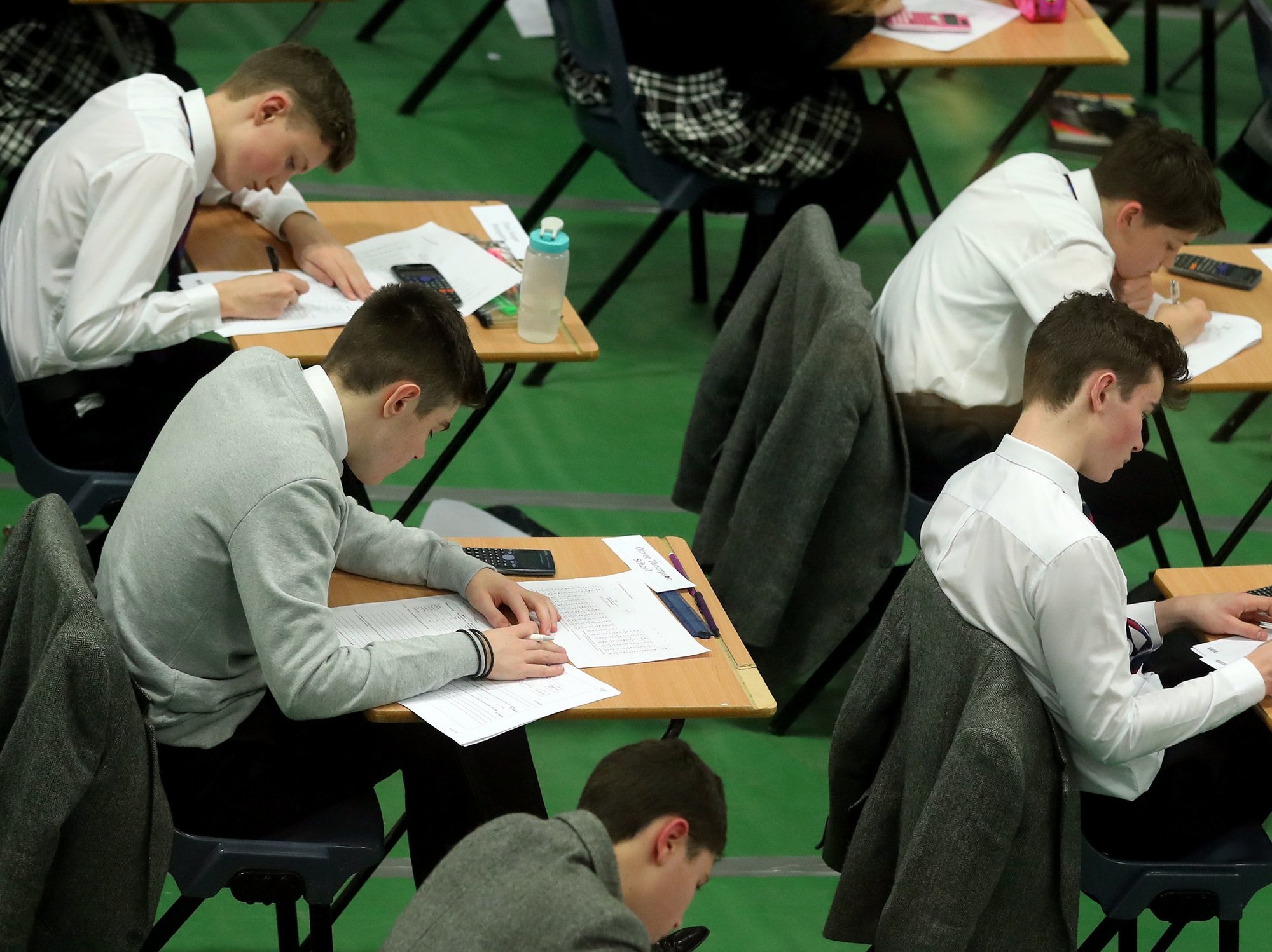 Pupils doing an exam in a school
