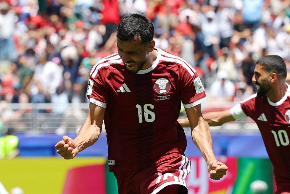 Qatar captain Boualem Khoukhi became a national hero with his late header