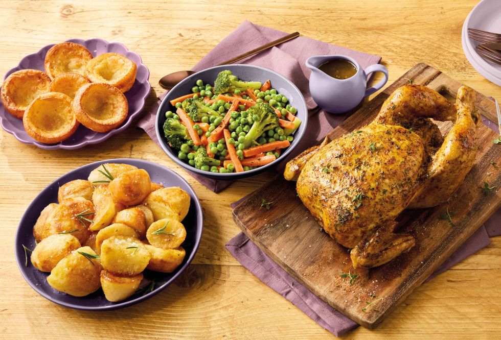 Roast potatoes, vegetables and chicken