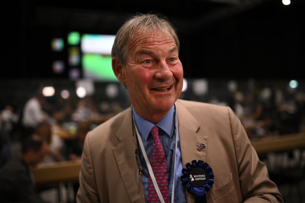 Rupert Lowe appeared to attract Nigel Farage's attention in Makerfield