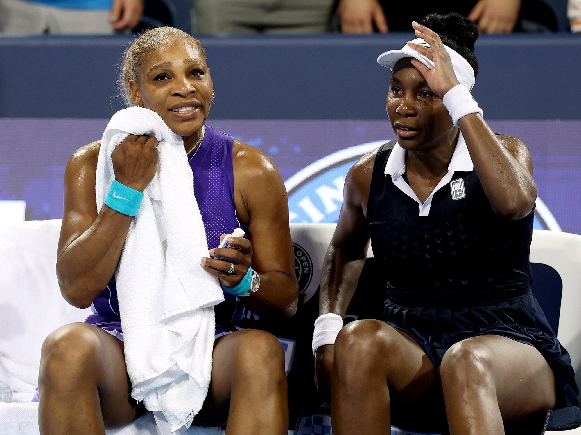 Serena and Venus Williams were united in their excitement at sharing a court again despite suffering an agonising defeat in their first doubles match together for four years