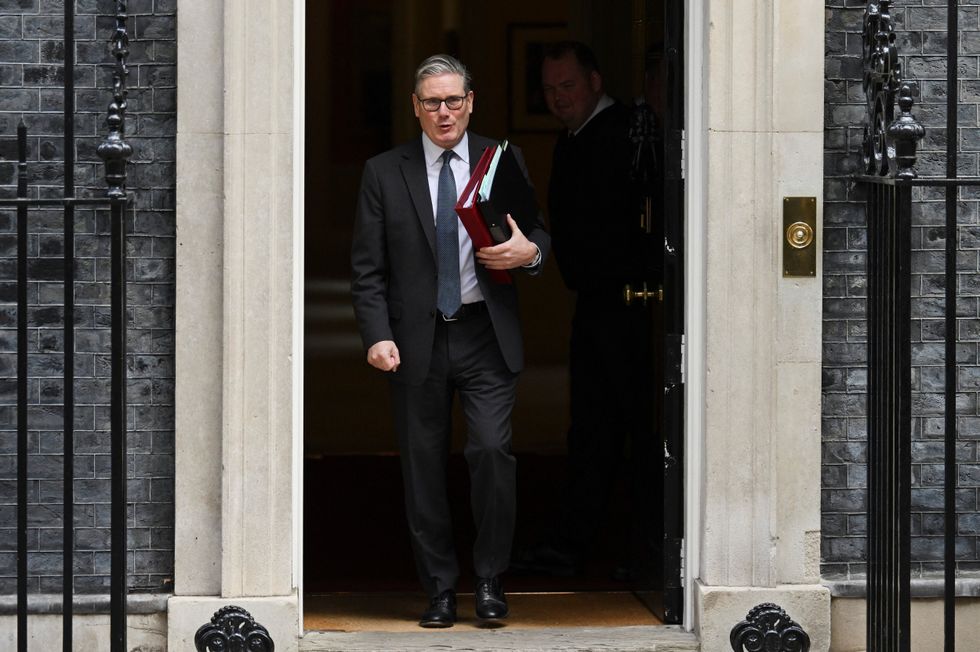 Sir Keir Starmer leaves Downing Street ahead of PMQs