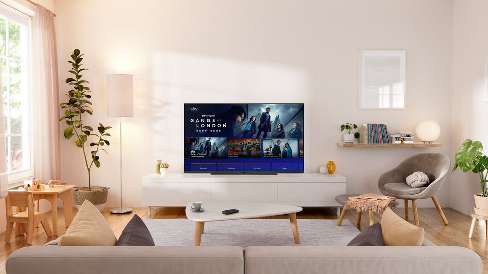 sky glass tv pictured in a living room showing gangs of london on-screen