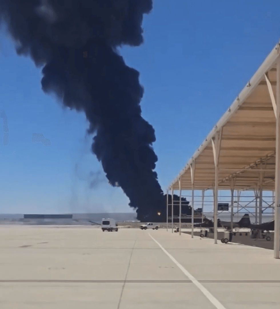 Smoke billows into the sky at Edwards Air Force Base after the horror crash