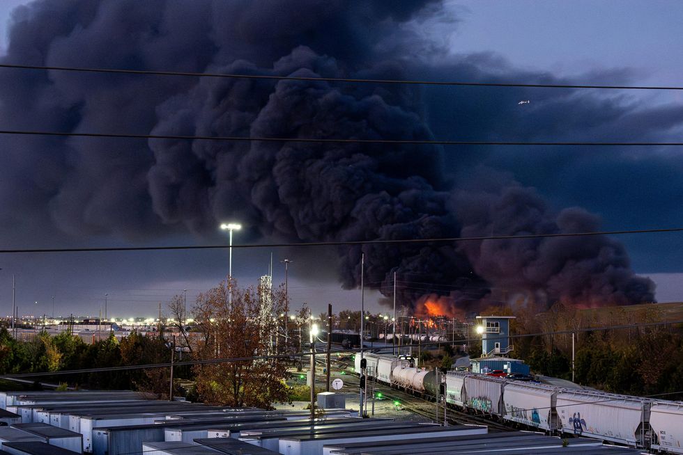 Smoke billows over Louisville after the crash