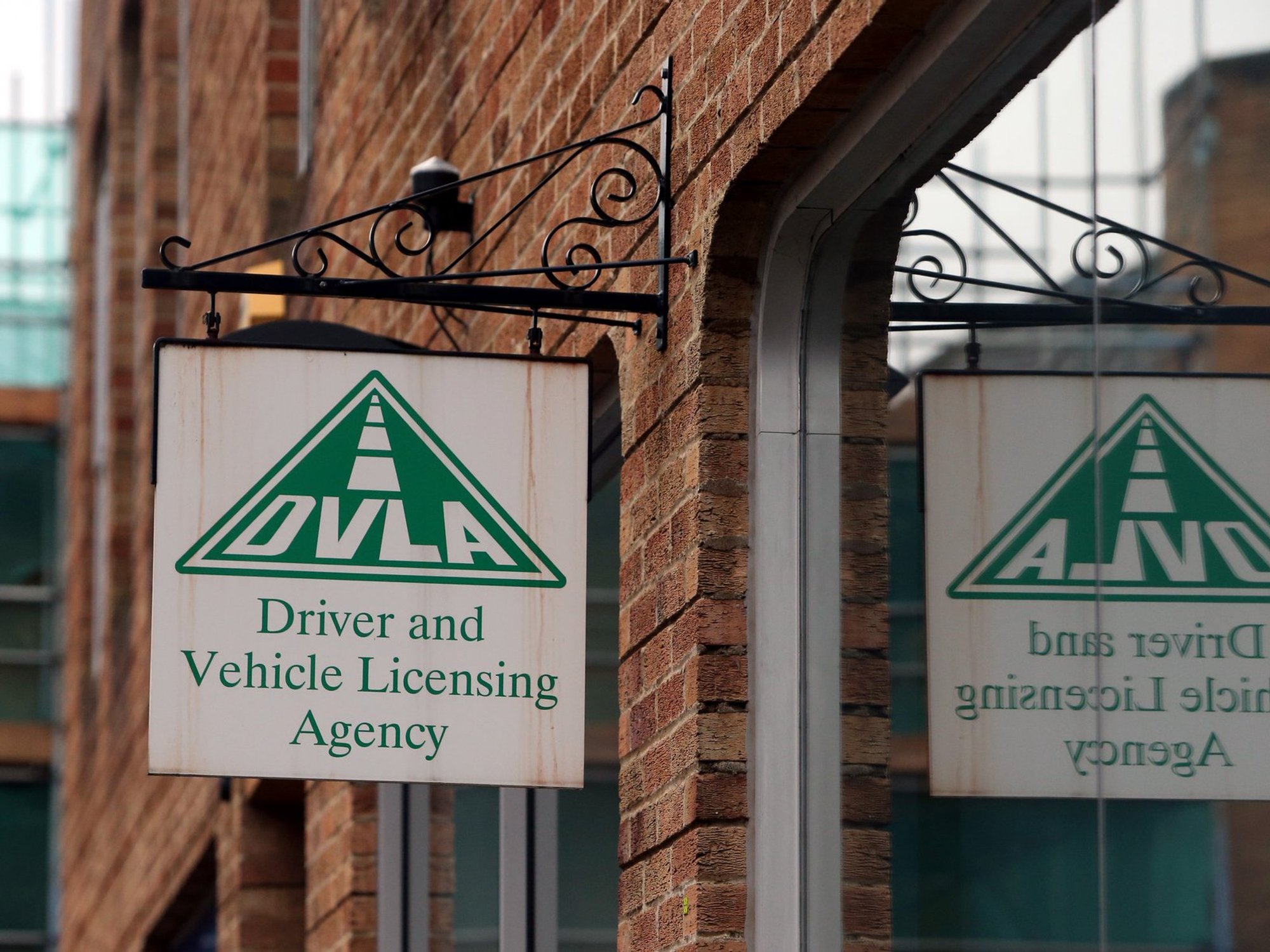 Innocent Briton arrested and detained for 16 hours after bungling DVLA handed him someone else's ban