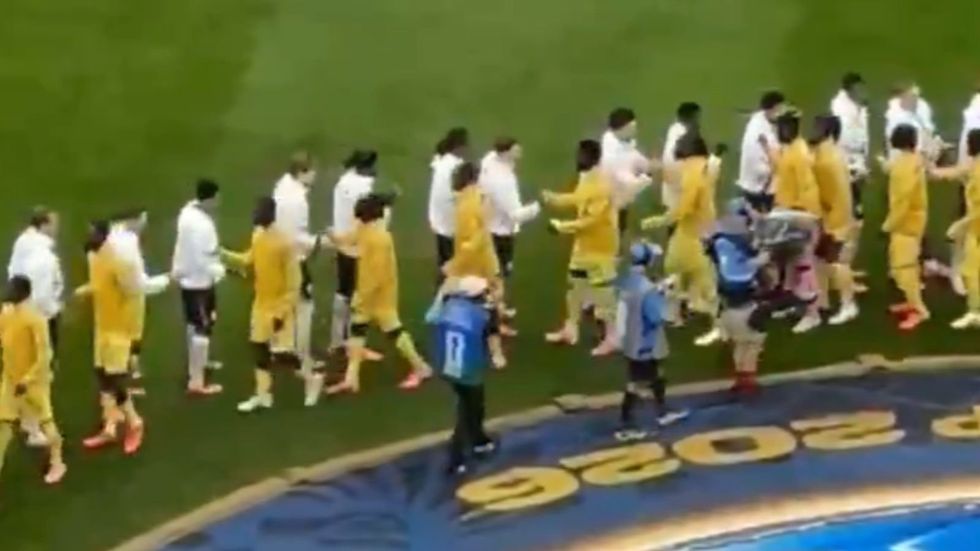 Spence appeared to avoid shaking hands with Partey