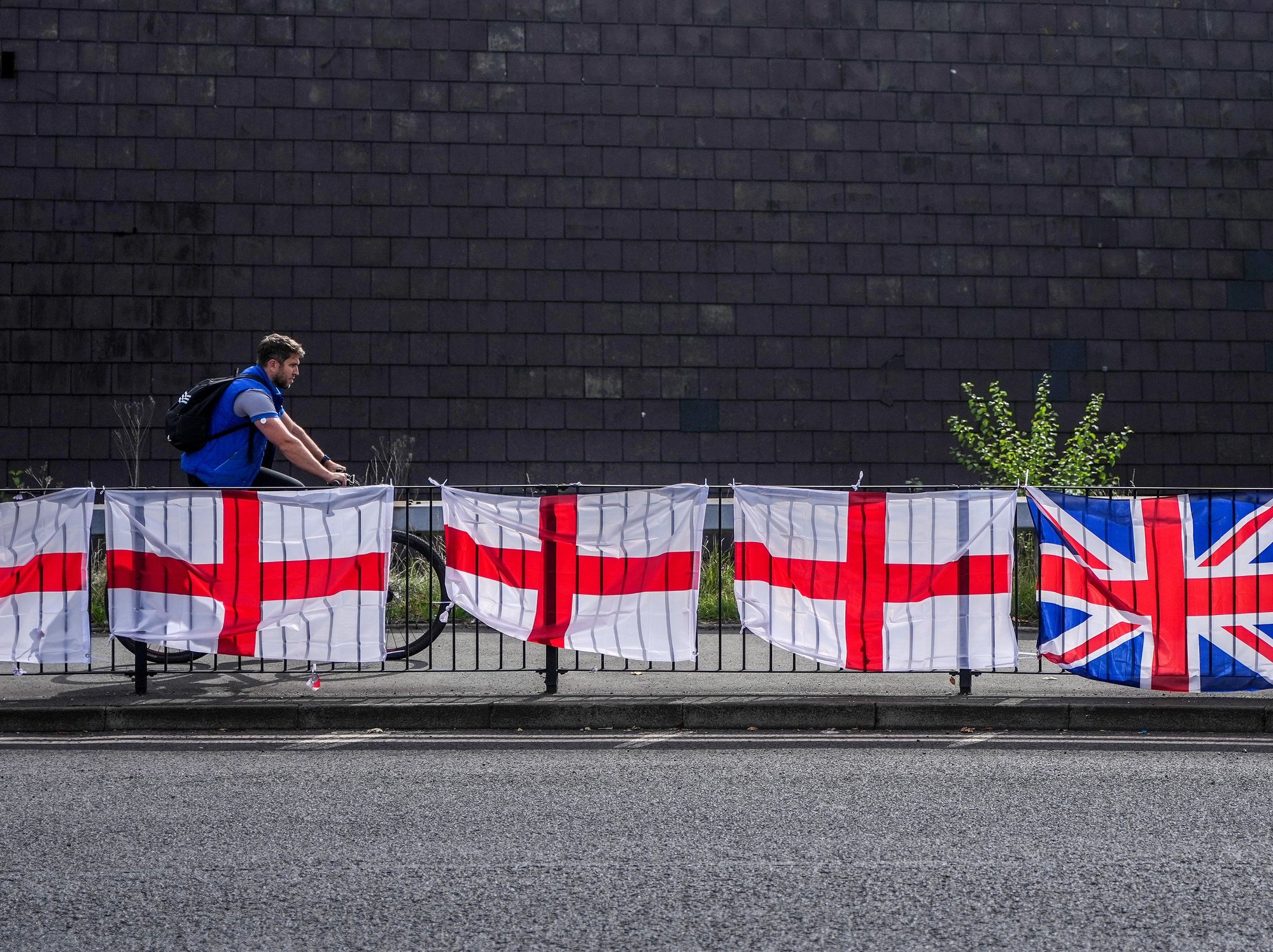 St George's crosses and Union flags hang in the sunshine in Birmingham