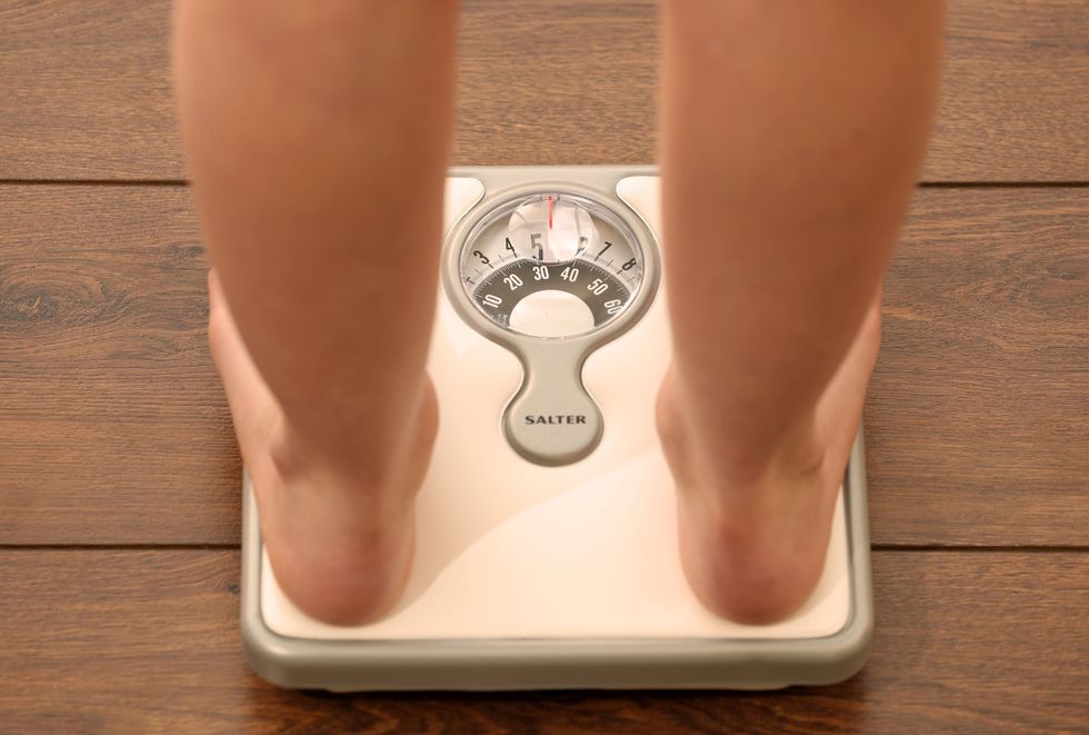 standing on scales