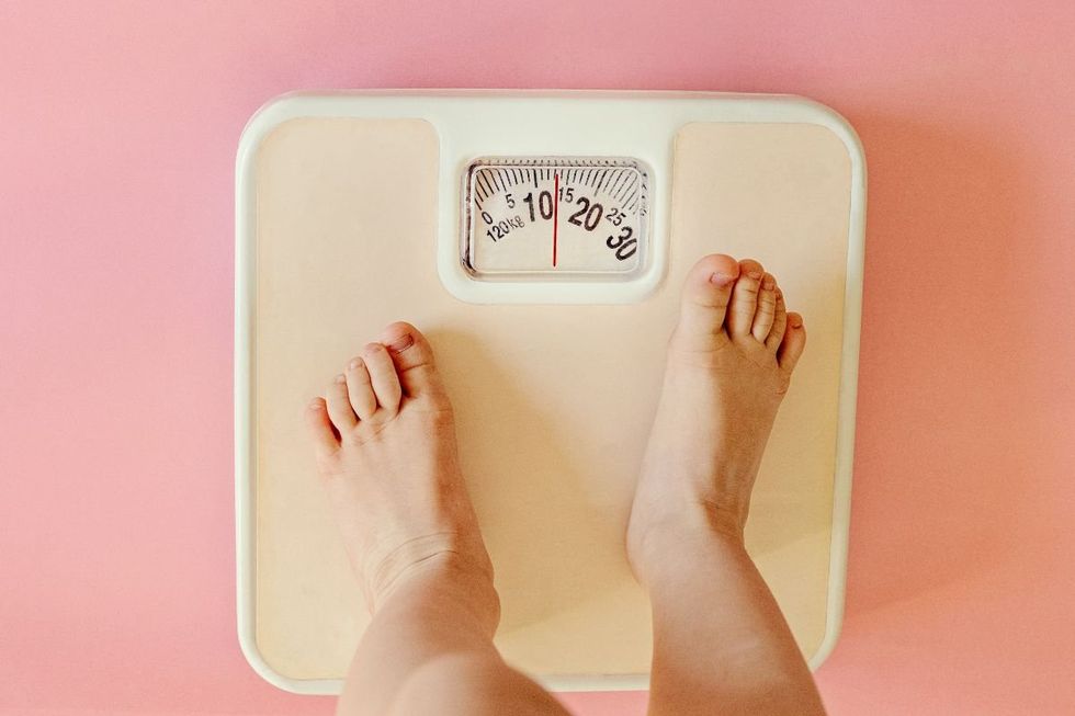 STANDING ON SCALES