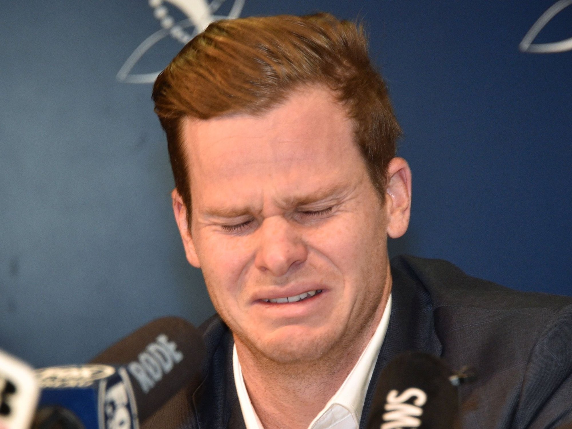 Steve Smith pictured crying during a press conference after losing the Australia captaincy in 2018