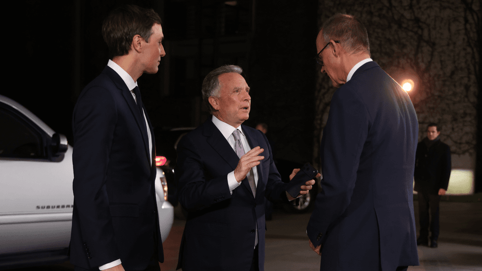 Steve Witkoff and Jared Kushner speaking to Chancellor Friedrich Merz