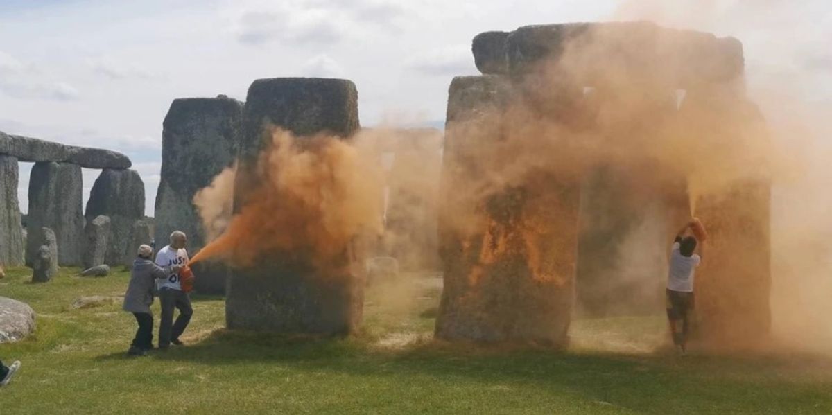Stonehenge: Just Stop Oil protesters charged with destroying ancient protected monument after throwing orange paint powder at Stonehenge