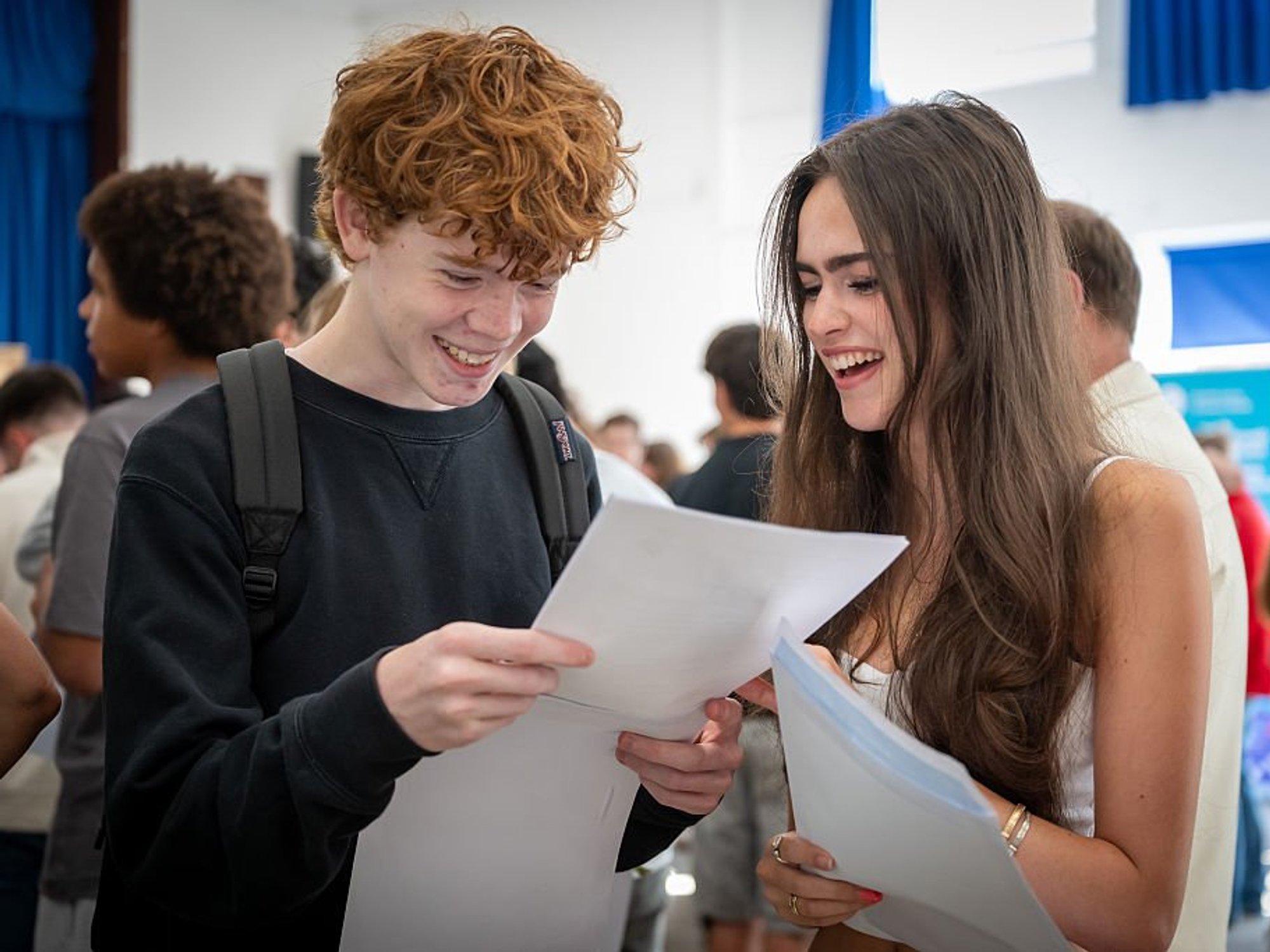 Top GCSE grades rise again as boys close gender gap to narrowest on record