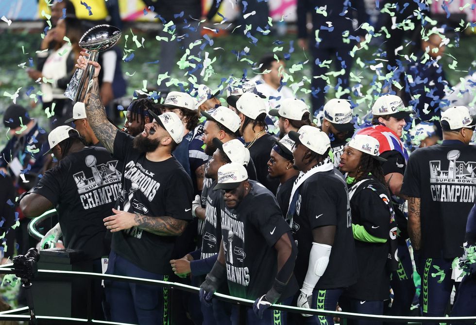 Super Bowl 60 trophy lift