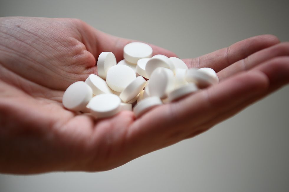 Supplements in a hand