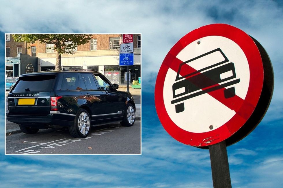 SUV parked and a car ban sign