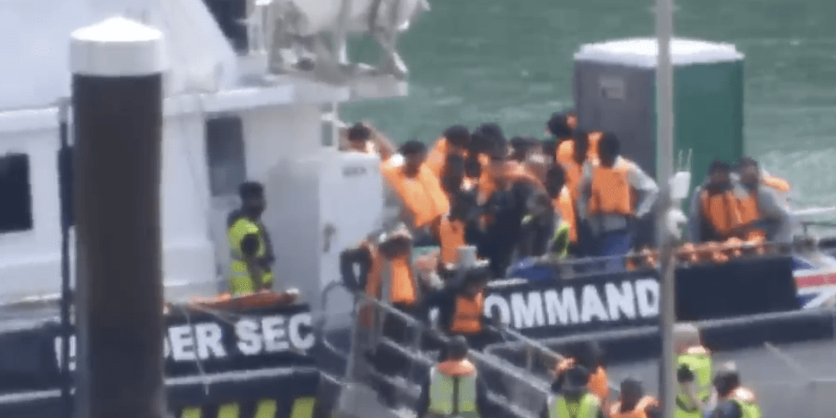 Mega dinghy carrying RECORD number of illegal migrants crosses Channel and reaches Britain