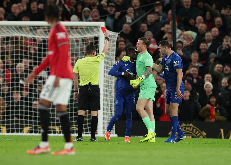 The red card came in the 13th minute after Idrissa Gueye slapped Michael Keane