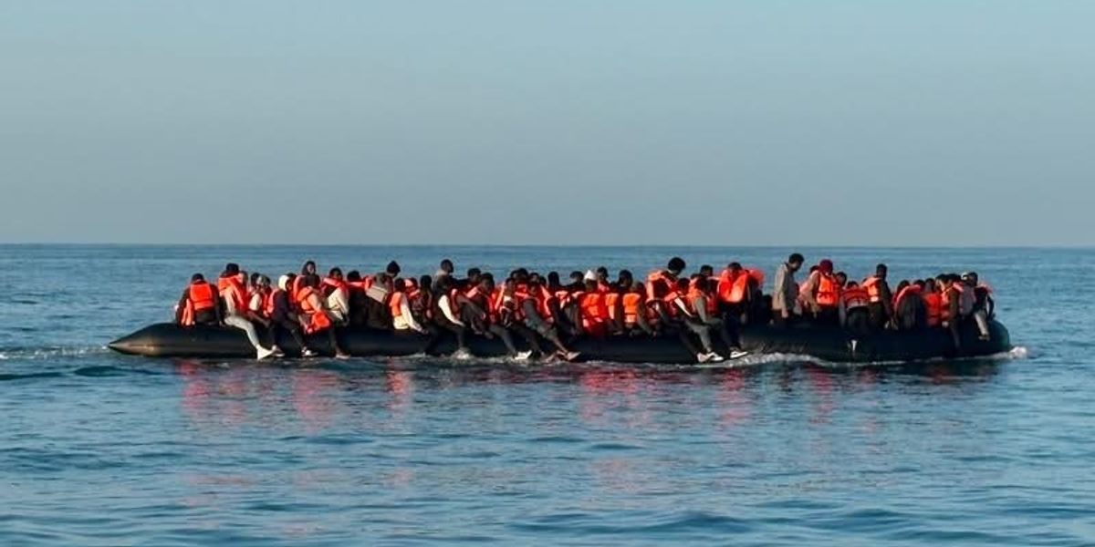 Migrant 'mega-dinghies' longer than double-decker bus rake in £300,000 a Channel crossing