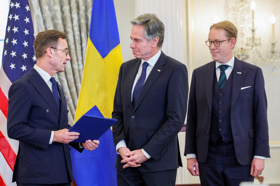 The three men meeting
