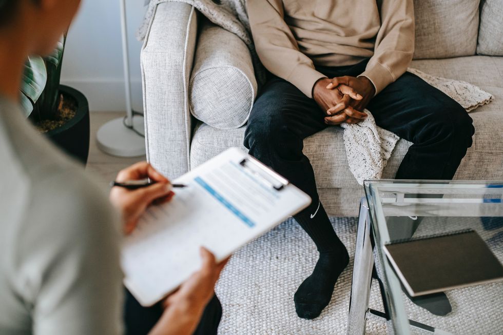 Therapist talking to a man