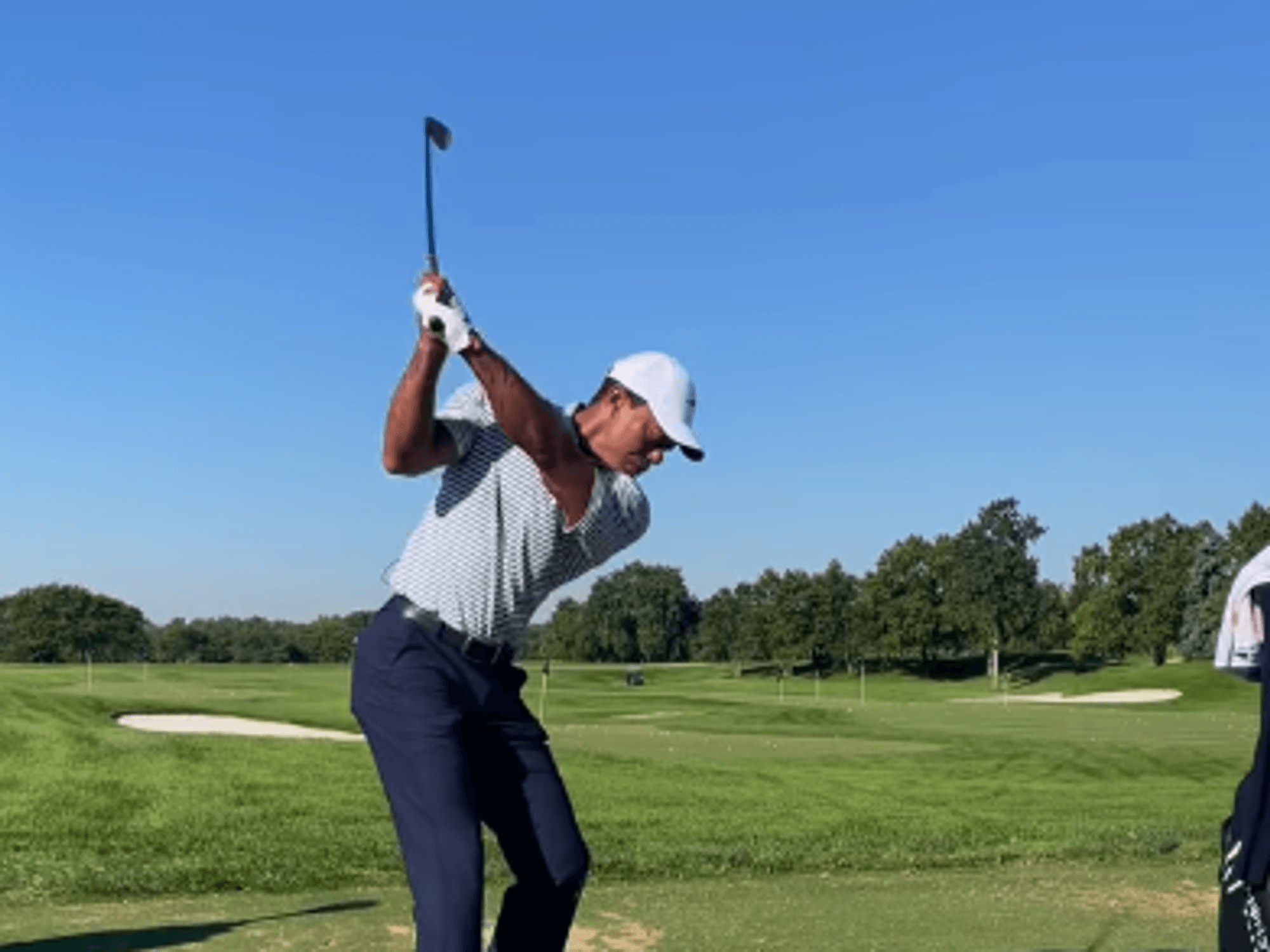 Tiger Woods has been seen playing golf for the first time since his DUI charge