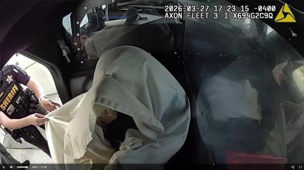 Tiger Woods was put under a blanket after his arrest